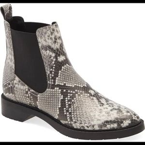 Black and white snakeskin Chelsea’s booties